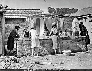 Images Dated 12th April 2012: Washerwomen in the environs of Rome intent on doing the laundry near a river