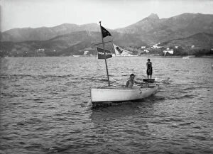 Images Dated 5th May 2009: Water-skiing: young woman with wooden planks to walk on water drawn from a boat, Isola d'Elba