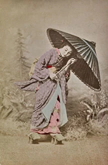 Japan: Woman in traditional dress with umbrella and wooden sandals, Japan, Japan