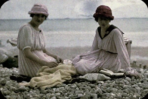 Featured Collection: Two women sitting on the beach