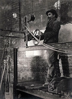 Images Dated 22nd June 2009: Worker in a 'Bullets Italian Factory' ('Fabbrica Italiana Proiettili'), 1920