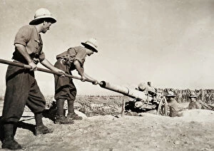 Images Dated 16th March 2009: WWII: Italian artillerymen busy cleaning their weapons