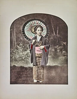 Japan: Young Japanese woman portrayed with kimono and wagasa (umbrella)