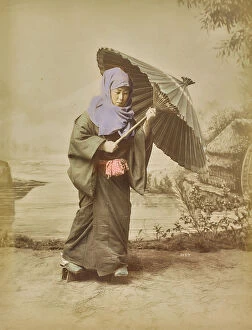 Japan: Young Japanese woman with an umbrella