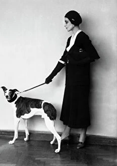 Images Dated 4th March 2010: Young woman with dog