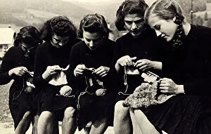 Images Dated 6th July 2011: Young women knitting