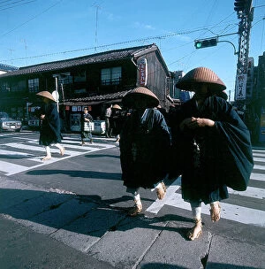 Japan: A zen monk in the streets of the city during the 'Taku hatsu' collection of alms
